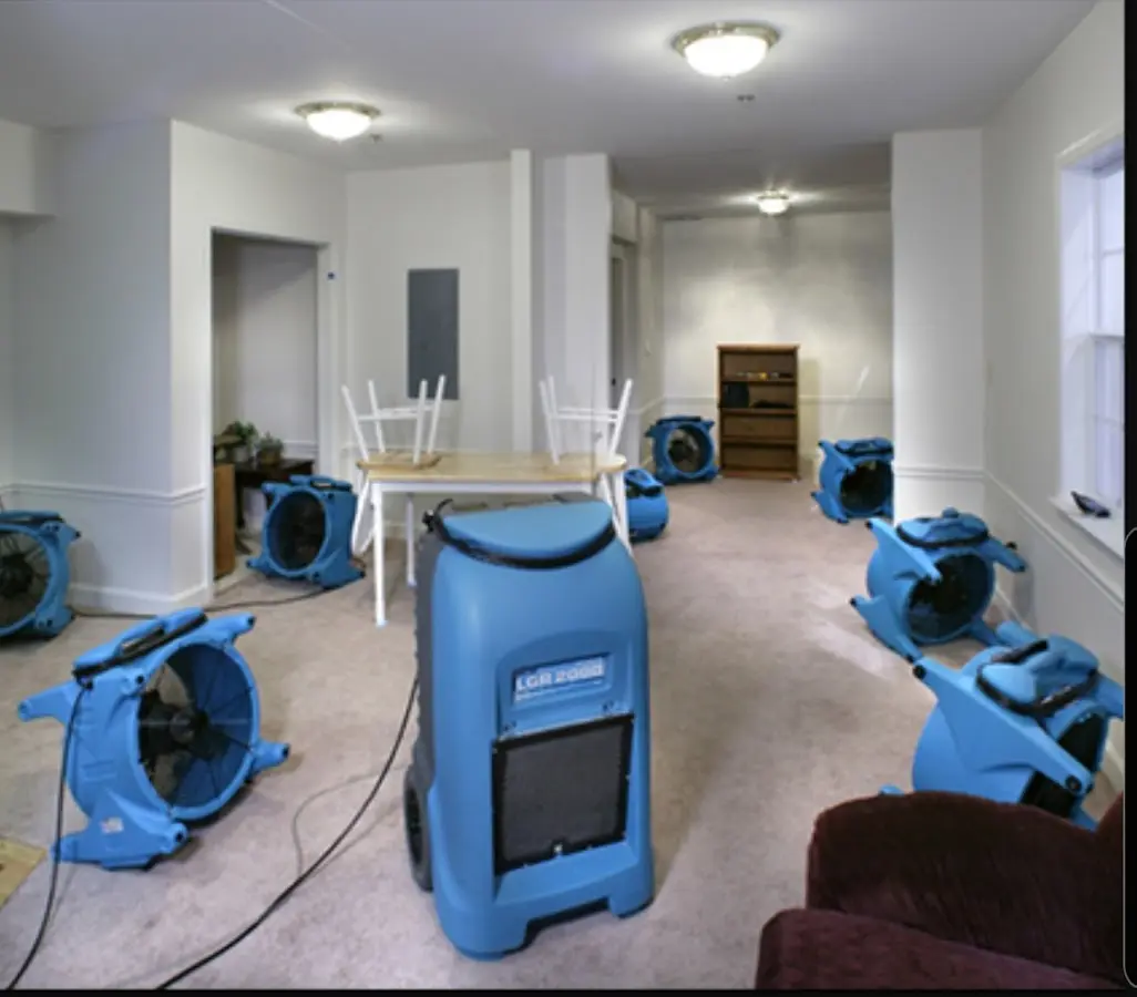 Air movers and dehumidifier setup for Water Damage Restoration in Blackstone